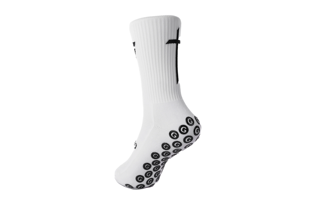 GearFit Invictus grip socks in white with black cross design, back view