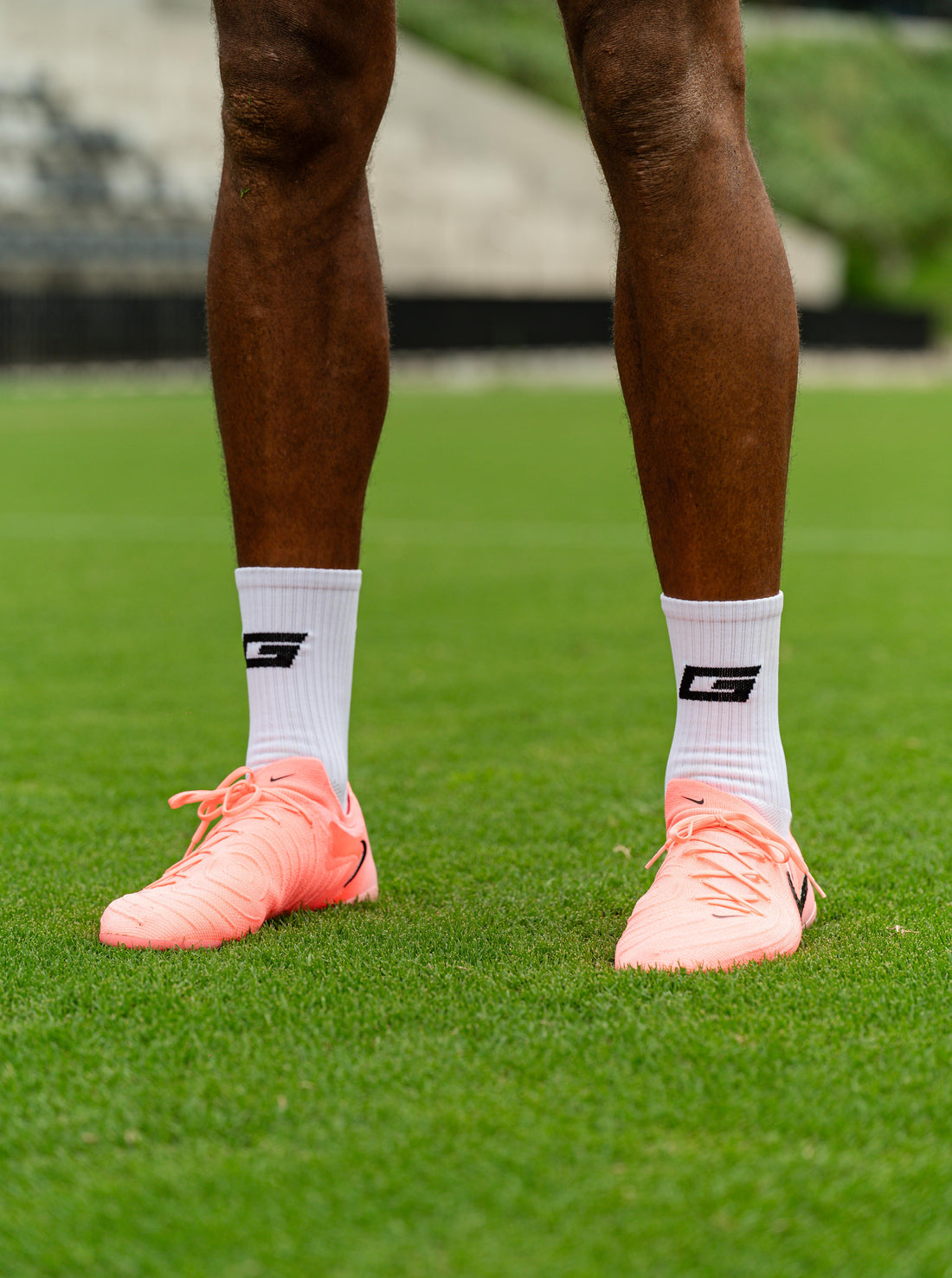 GearFit Invictus grip socks in white with black cross design