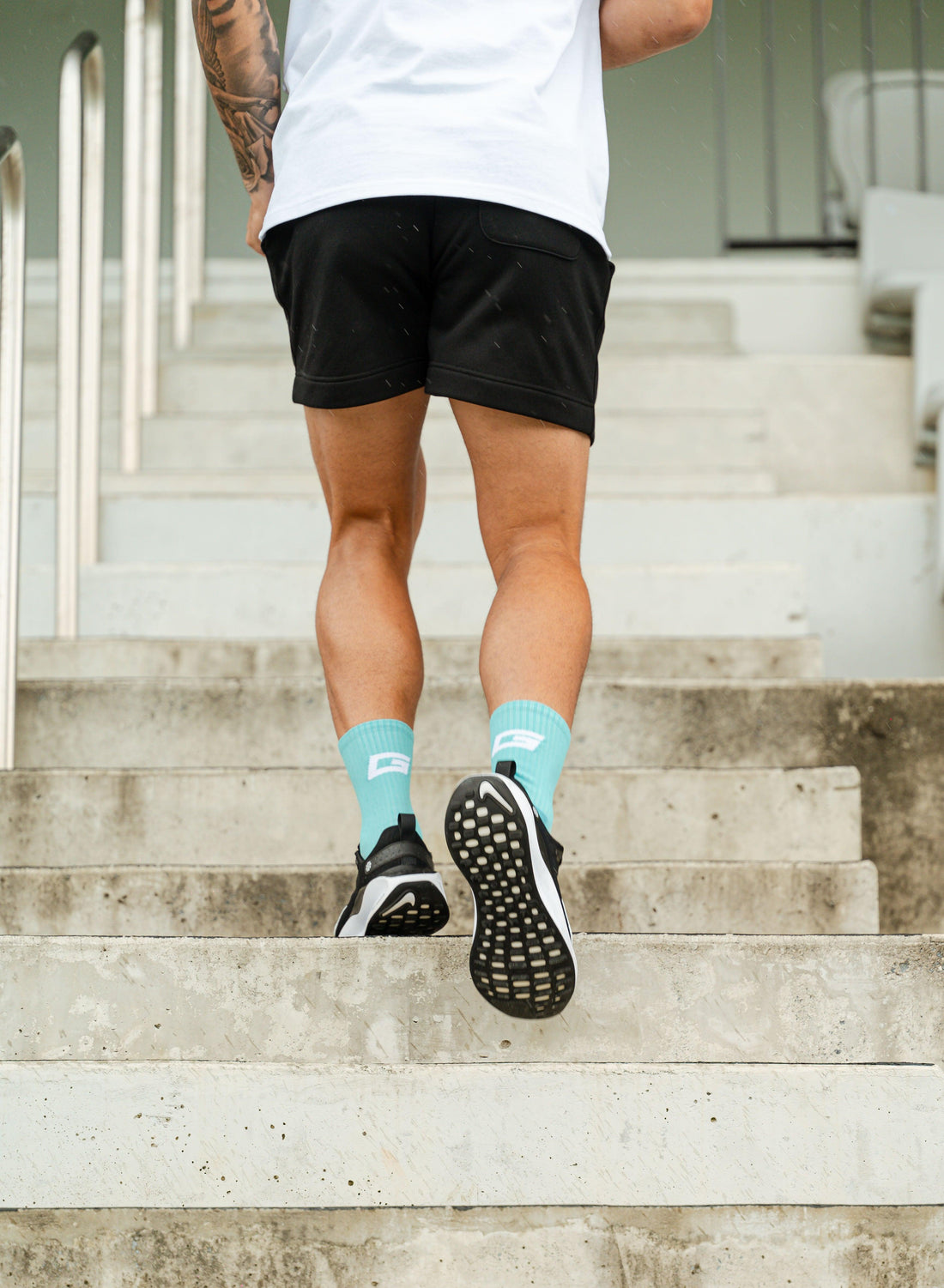 GearFit Aqua grip socks in bright blue, alternate lifestyle photo