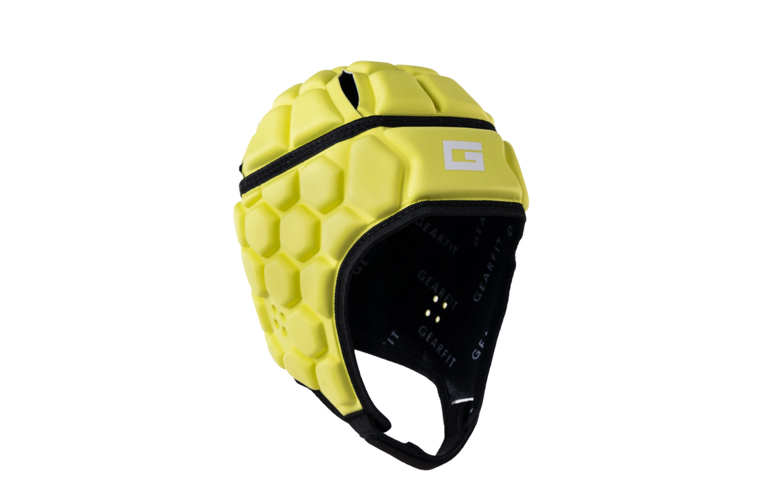 GearFit Volt rugby headgear in bright yellow with white cross design, studio product photo