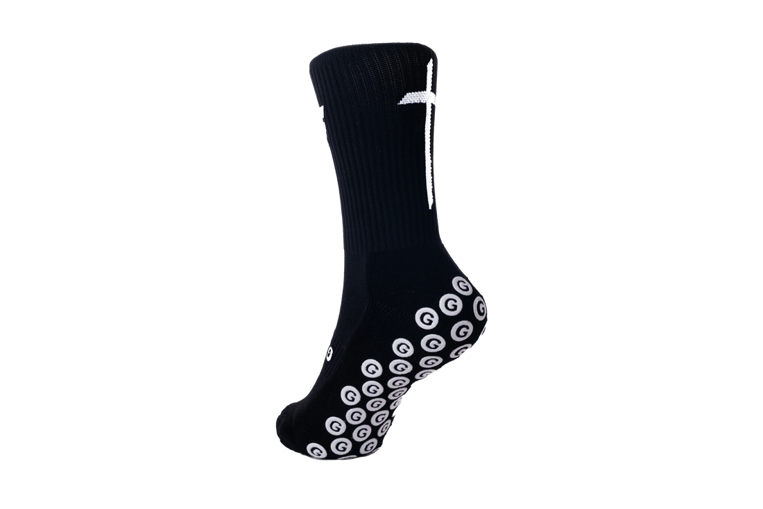 GearFit Legacy grip socks in black with cross design, back view
